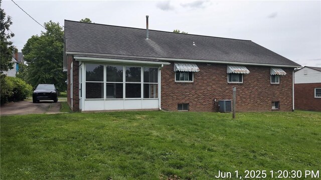 175 Sherman Ave, Waynsbrg/Frankln Twp, PA 15370 - back of house with a yard, brick siding, central AC unit, and a shingled roof