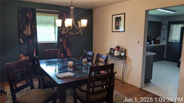 175 Sherman Ave, Waynsbrg/Frankln Twp, PA 15370 - dining room with a chandelier and wood finished floors