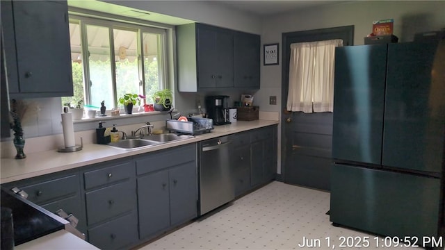 175 Sherman Ave, Waynsbrg/Frankln Twp, PA 15370 - kitchen with freestanding refrigerator, dishwashing machine, a sink, light countertops, and gray cabinets