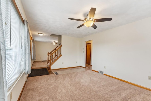 207 Mccartney Dr, Moon/Crescent Twp, PA 15108 - unfurnished room with ceiling fan, carpet flooring, baseboards, and stairs