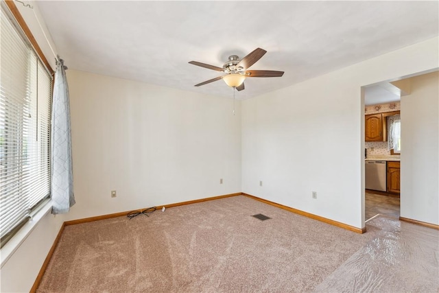207 Mccartney Dr, Moon/Crescent Twp, PA 15108 - empty room with light colored carpet, ceiling fan, and baseboards