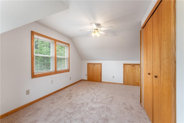 207 Mccartney Dr, Moon/Crescent Twp, PA 15108 - bonus room with vaulted ceiling, baseboards, light carpet, and a ceiling fan