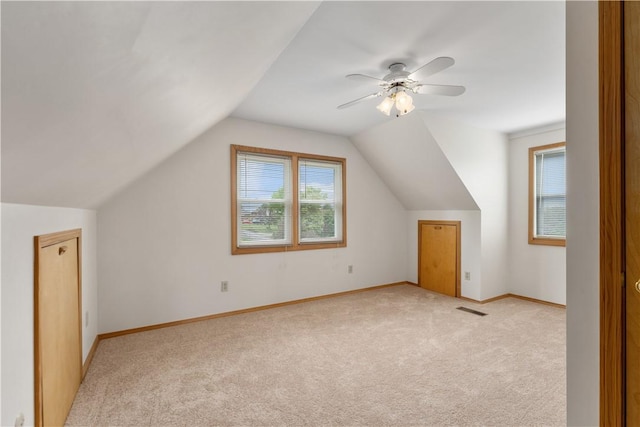 207 Mccartney Dr, Moon/Crescent Twp, PA 15108 - additional living space featuring light carpet, vaulted ceiling, baseboards, and ceiling fan