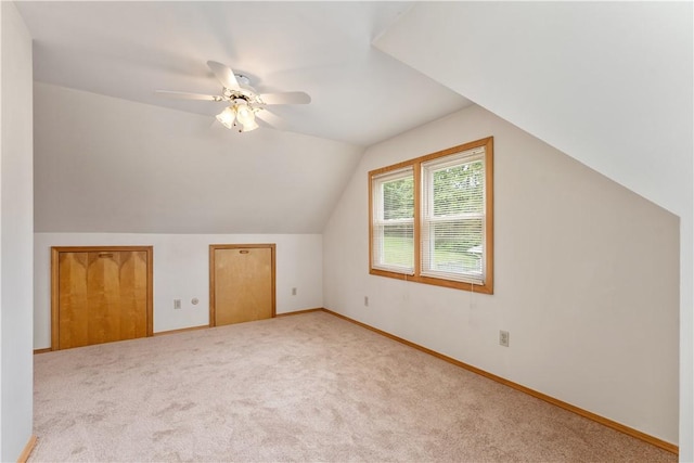 207 Mccartney Dr, Moon/Crescent Twp, PA 15108 - additional living space with carpet flooring, vaulted ceiling, ceiling fan, and baseboards