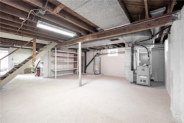 207 Mccartney Dr, Moon/Crescent Twp, PA 15108 - below grade area featuring heating unit, stairway, and water heater