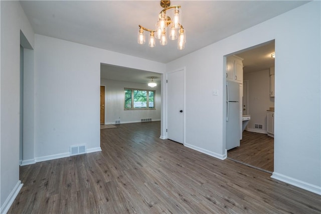 126 Woodhall Dr, Baldwin Boro, PA 15236 - empty room with a chandelier, wood finished floors, and baseboards