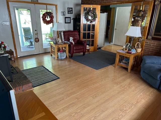 290 Gray Station Rd, Derry Twp, PA 15717 - living room with french doors and wood finished floors