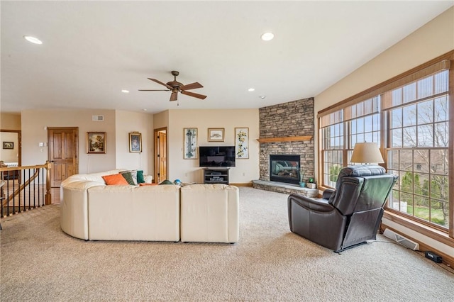 127 Chelsea Dr, Unity Twp, PA 15650 - carpeted living area featuring a ceiling fan, recessed lighting, and a fireplace