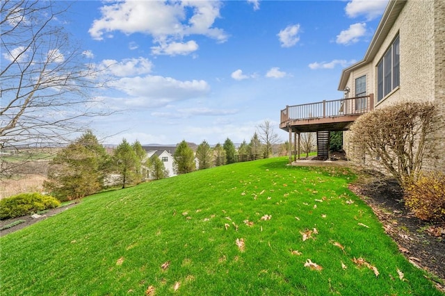 127 Chelsea Dr, Unity Twp, PA 15650 - view of grassy yard with a wooden deck and stairway
