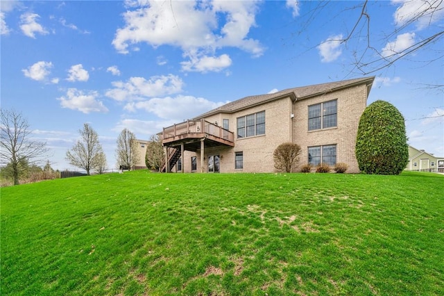 127 Chelsea Dr, Unity Twp, PA 15650 - back of house with stairway, a deck, and a yard