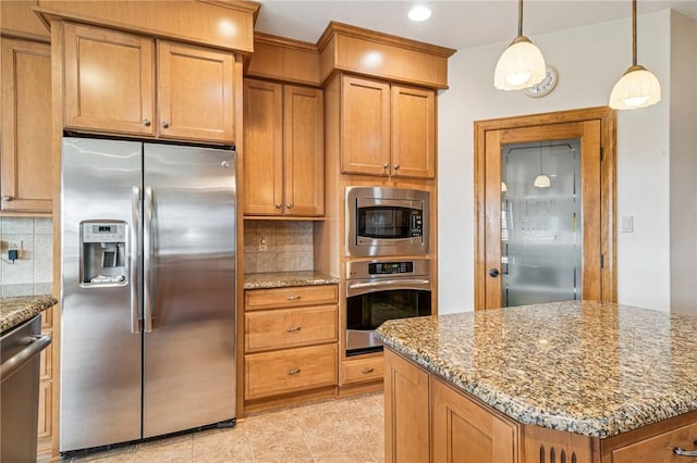 127 Chelsea Dr, Unity Twp, PA 15650 - kitchen featuring appliances with stainless steel finishes, backsplash, light stone countertops, brown cabinets, and recessed lighting