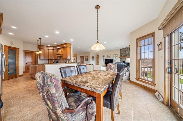 127 Chelsea Dr, Unity Twp, PA 15650 - dining area featuring recessed lighting, baseboards, and a fireplace
