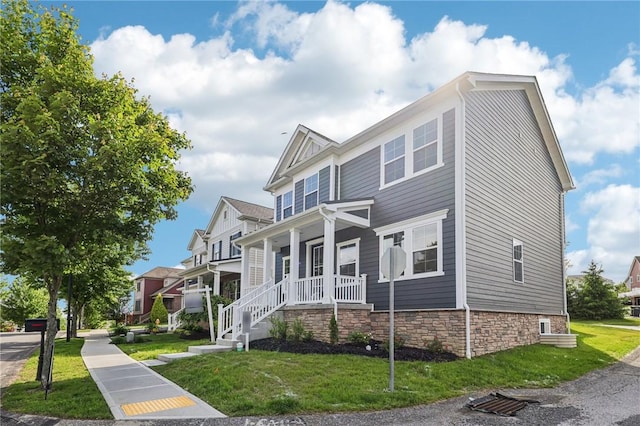 1213 Newbury Highland, South Fayette, PA 15017 - view of front facade with covered porch and a front yard