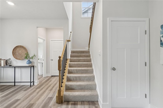 1213 Newbury Highland, South Fayette, PA 15017 - stairway with wood finished floors and baseboards