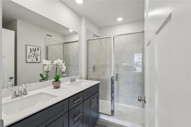 1213 Newbury Highland, South Fayette, PA 15017 - bathroom featuring double vanity, a shower stall, and recessed lighting