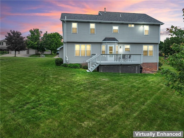 115 Lawrence Dr, Brighton Twp, PA 15009 - back of property at dusk with a deck, a yard, and roof with shingles