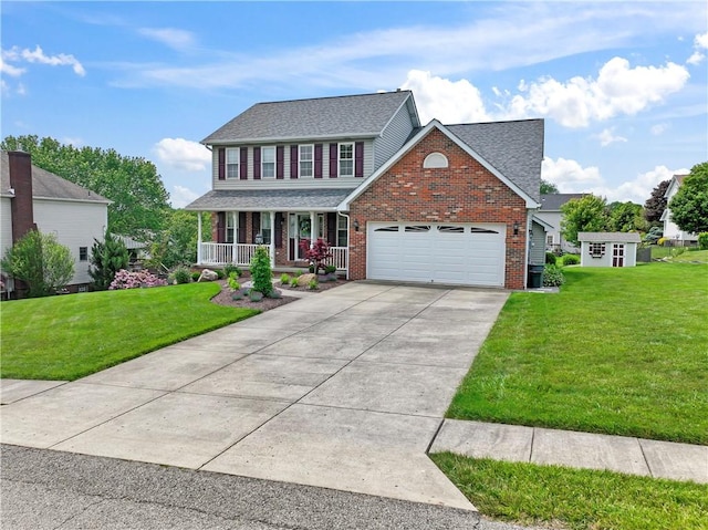 115 Lawrence Dr, Brighton Twp, PA 15009 - view of front of house with a porch, brick siding, a front yard, and a garage