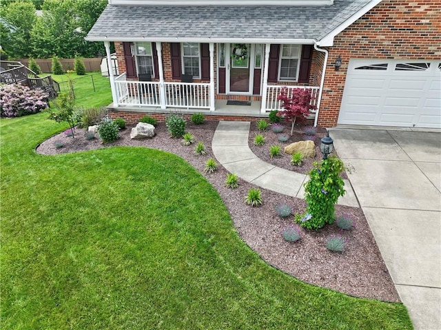 115 Lawrence Dr, Brighton Twp, PA 15009 - view of front facade with a porch, a shingled roof, brick siding, and an attached garage