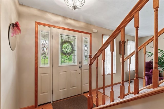 115 Lawrence Dr, Brighton Twp, PA 15009 - entrance foyer featuring stairway and baseboards