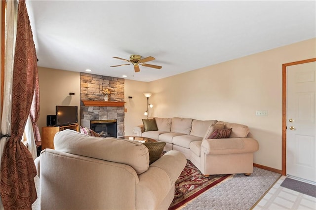 115 Lawrence Dr, Brighton Twp, PA 15009 - living room with ceiling fan, a stone fireplace, light floors, and baseboards