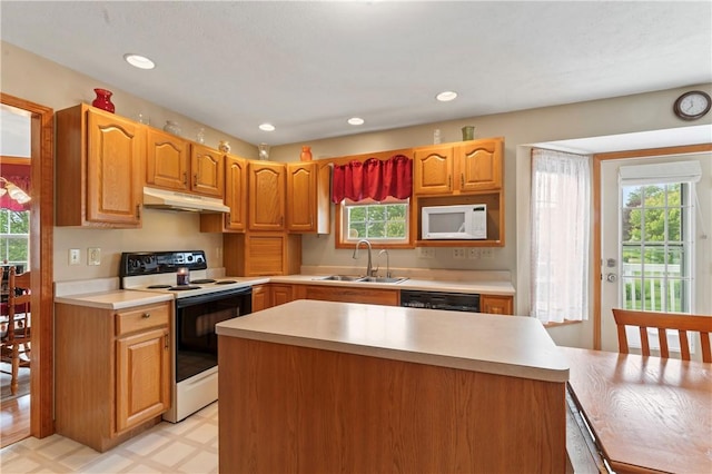 115 Lawrence Dr, Brighton Twp, PA 15009 - kitchen with white appliances, a sink, plenty of natural light, light countertops, and recessed lighting