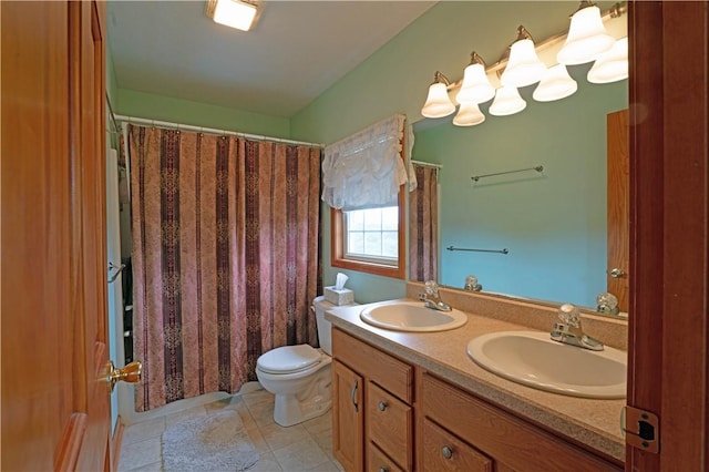 115 Lawrence Dr, Brighton Twp, PA 15009 - full bath featuring toilet, double vanity, tile patterned flooring, and shower / tub combo with curtain