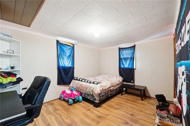 1230 Frank Ave, Jeannette, PA 15644 - bedroom featuring ornamental molding, wood finished floors, and a desk