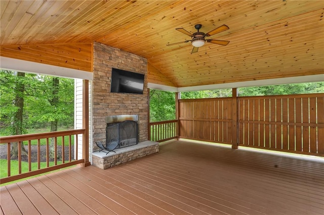 929 White Water, Adams Twp, PA 16046 - deck with an outdoor stone fireplace and a ceiling fan