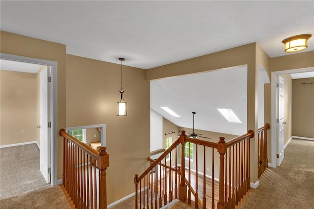 929 White Water, Adams Twp, PA 16046 - hall featuring an upstairs landing, carpet floors, baseboards, and a skylight