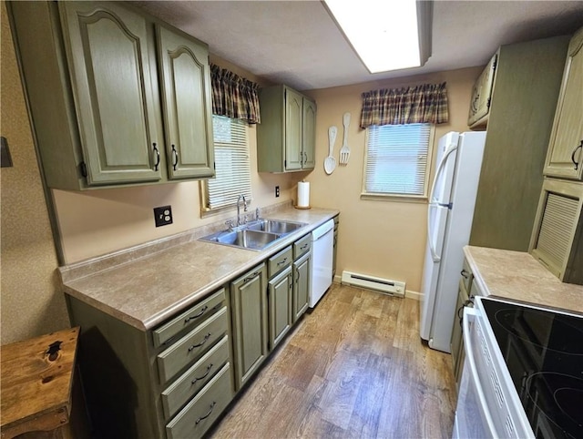 261 Lacock St, Canton Twp, PA 15301 - kitchen with a sink, baseboard heating, white appliances, light wood-style floors, and green cabinetry