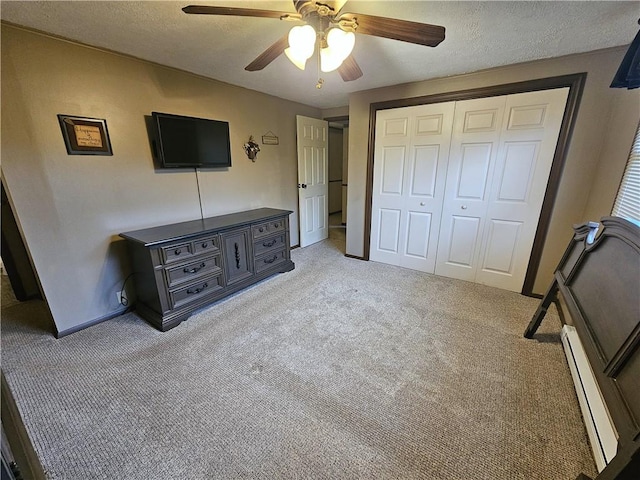 261 Lacock St, Canton Twp, PA 15301 - unfurnished bedroom featuring a baseboard radiator, carpet, a closet, ceiling fan, and baseboards
