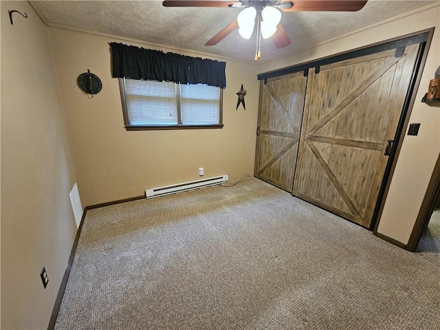 261 Lacock St, Canton Twp, PA 15301 - unfurnished bedroom with a baseboard heating unit, carpet flooring, a textured ceiling, a ceiling fan, and baseboards