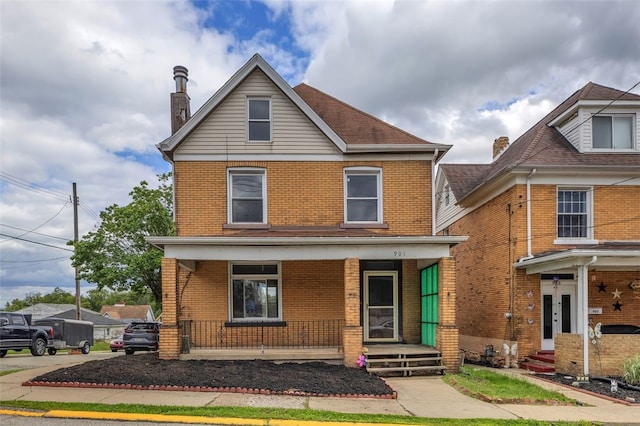 901 Punta Gorda Ave, East Mckeesport, PA 15035 - traditional-style home with brick siding and a porch
