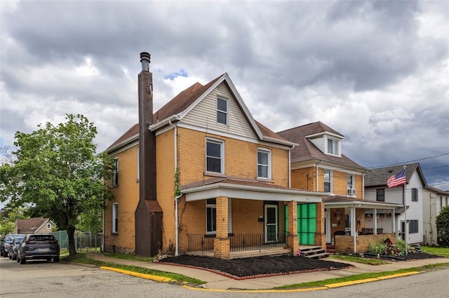 901 Punta Gorda Ave, East Mckeesport, PA 15035 - view of front of house featuring covered porch and brick siding