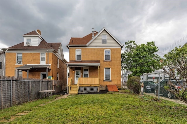 901 Punta Gorda Ave, East Mckeesport, PA 15035 - rear view of property featuring brick siding and a chimney