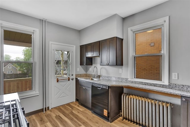 901 Punta Gorda Ave, East Mckeesport, PA 15035 - kitchen with radiator, black dishwasher, a sink, dark brown cabinetry, and light wood-type flooring
