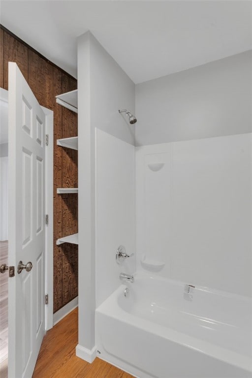 901 Punta Gorda Ave, East Mckeesport, PA 15035 - full bathroom featuring shower / tub combination, wood finished floors, and baseboards