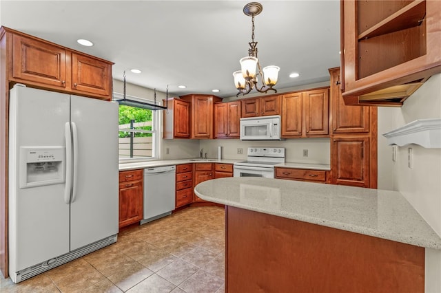 344 Fruitwood Dr, Bethel Park, PA 15102 - kitchen with white appliances, a chandelier, a sink, brown cabinetry, and recessed lighting