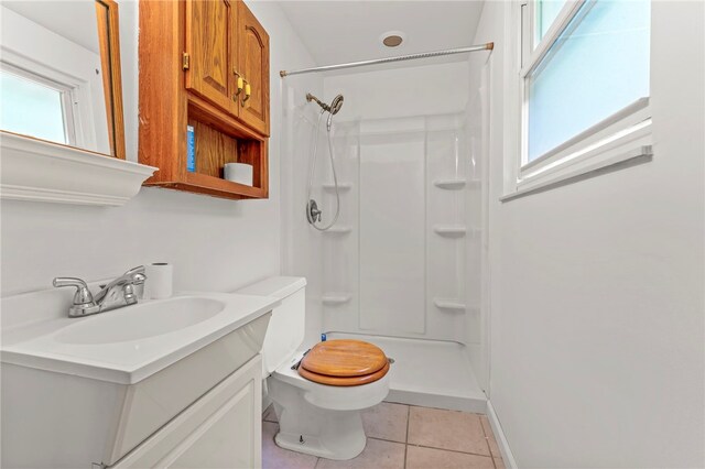 344 Fruitwood Dr, Bethel Park, PA 15102 - full bath featuring a shower, toilet, tile patterned floors, and vanity