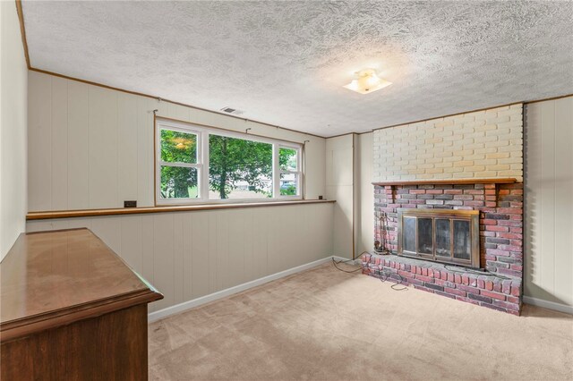 344 Fruitwood Dr, Bethel Park, PA 15102 - unfurnished living room with carpet, a textured ceiling, a brick fireplace, and baseboards