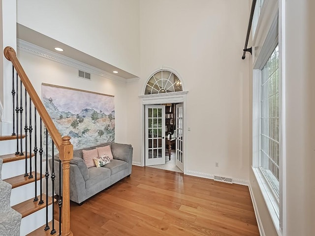 906 Big Bear Ct, Adams Twp, PA 15044 - sitting room featuring a high ceiling, light wood-style flooring, baseboards, ornamental molding, and recessed lighting