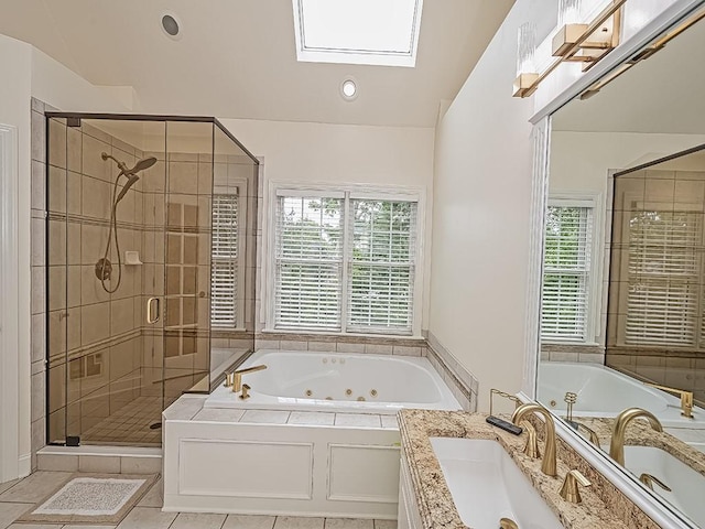 906 Big Bear Ct, Adams Twp, PA 15044 - bathroom featuring healthy amount of natural light, a stall shower, a jetted tub, a skylight, and recessed lighting
