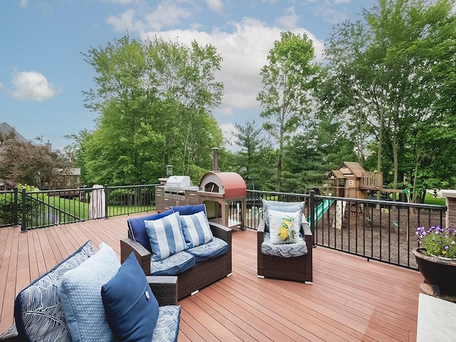 906 Big Bear Ct, Adams Twp, PA 15044 - wooden deck featuring an outdoor hangout area, grilling area, a playground, and view of wooded area