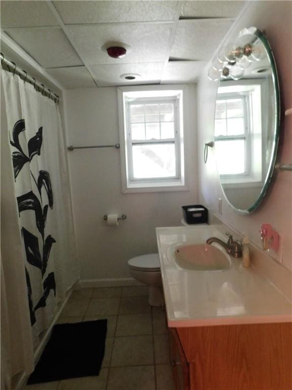 2300 Fairland St, Overbrook, PA 15210 - bathroom with a paneled ceiling, vanity, toilet, tile patterned flooring, and a shower with curtain