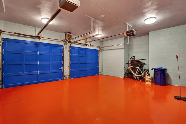 222 Schenley Rd, Squirrel Hill, PA 15217 - garage featuring concrete block wall and a garage door opener