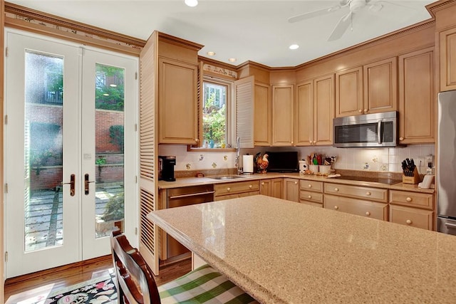 222 Schenley Rd, Squirrel Hill, PA 15217 - kitchen with stainless steel appliances, french doors, healthy amount of natural light, tasteful backsplash, and recessed lighting