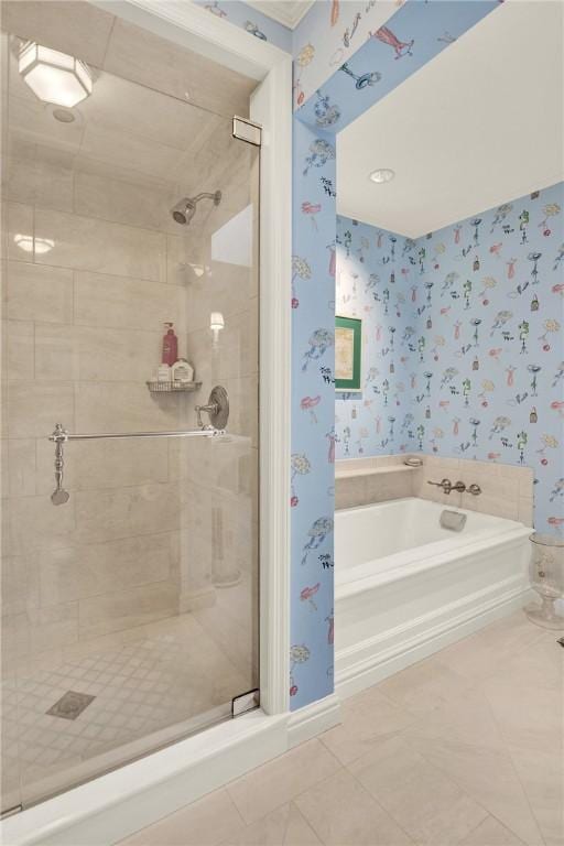 222 Schenley Rd, Squirrel Hill, PA 15217 - bathroom with wallpapered walls, a bath, a stall shower, tile patterned flooring, and baseboards