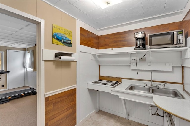 427 Harpers Ferry Rd, North Sewickley Twp, PA 15010 - kitchen with stainless steel microwave, white cooktop, light countertops, baseboards, and a sink
