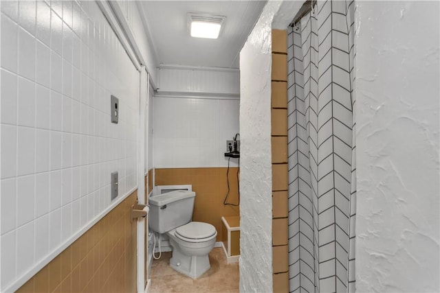 427 Harpers Ferry Rd, North Sewickley Twp, PA 15010 - bathroom with tile walls, toilet, a shower, and tile patterned floors