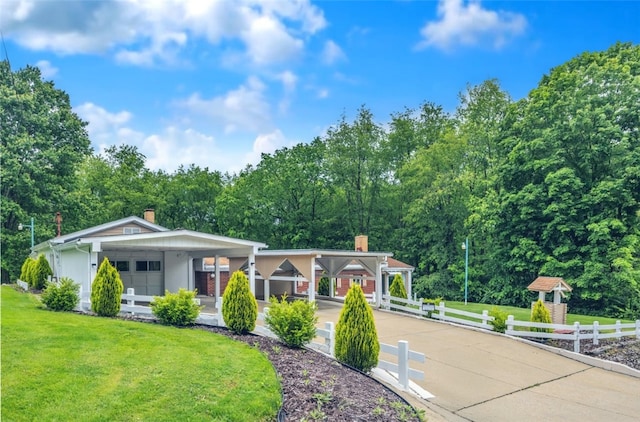 427 Harpers Ferry Rd, North Sewickley Twp, PA 15010 - view of front of home featuring a carport, concrete driveway, and a chimney